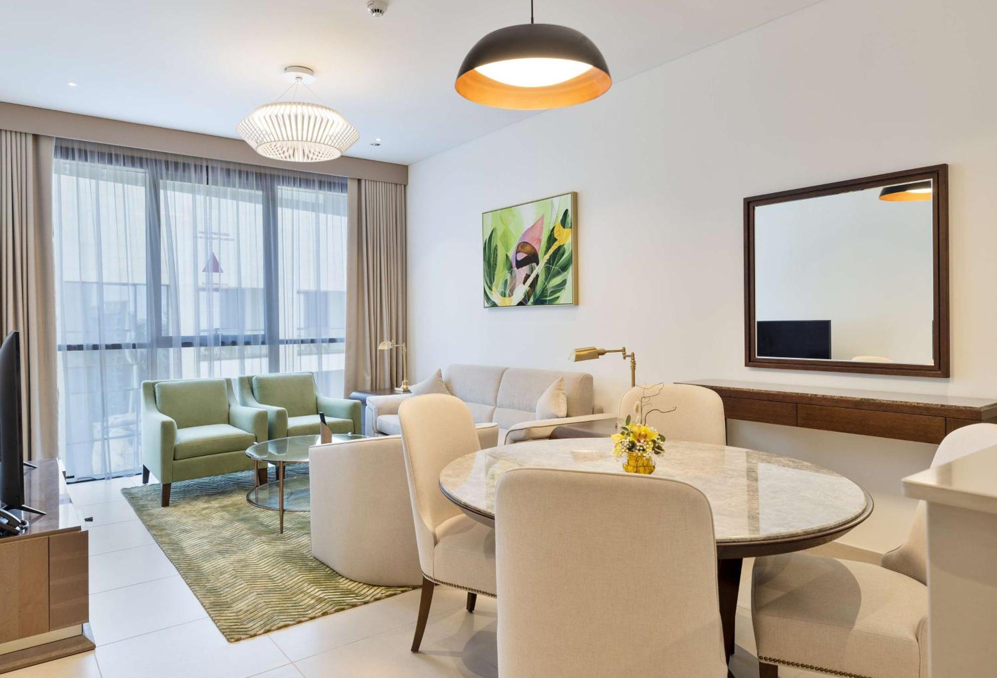 Hotel Doubletree By Hilton Doha Downtown Exterior foto A living room in a typical apartment